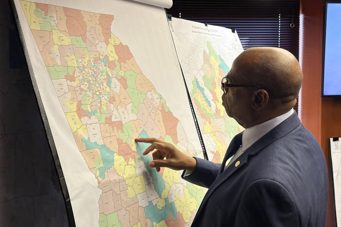 Georgia state Rep. Mack Jackson, D-Sandersville, looks at a map of proposed state House districts at the Georgia Capitol in Atlanta, Nov. 29, 2023. 