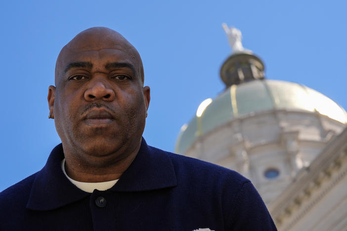 Michael Woolfolk poses for a photo at the state capitol, Thursday, March 6, 2025, in Atlanta. (AP Photo/Mike Stewart)