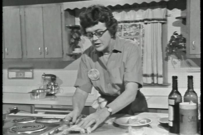 In this episode of The French Chef, Julia Child prepares Coq Au Vin.