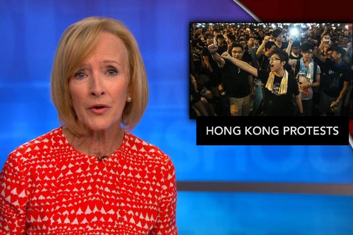 News Wrap: Violence erupts between police and protesters in Hong Kong