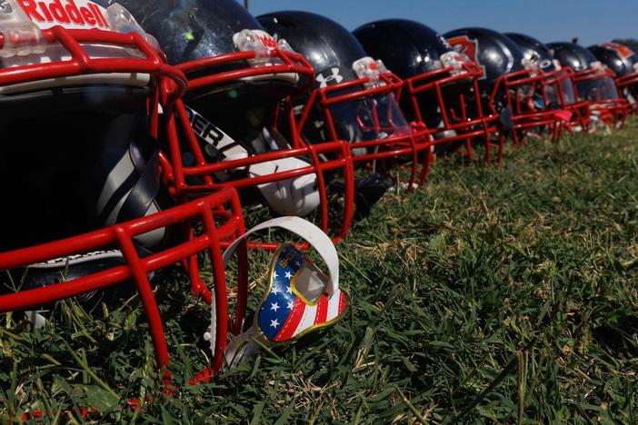 Why communities of color are embracing youth tackle football despite safety concerns