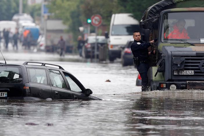 Floodwaters wreaked havoc in Paris as the River Seine rose 18 feet above normal levels.