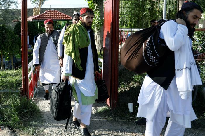 News Wrap: Afghan government begins releasing Taliban prisoners