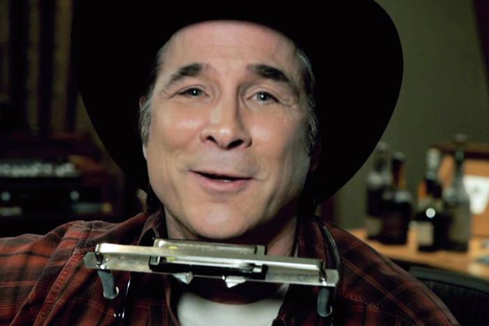 Clint Black meets Elyse Luray and tells her how he came to own this book.