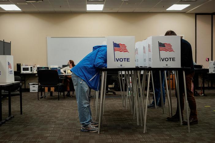 Risks of political violence and voter intimidation loom over midterms