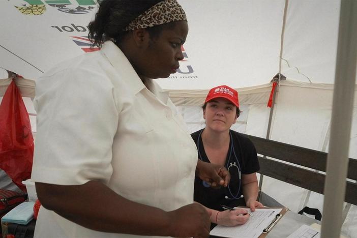 In an NGO-run temporary camp, health workers try to prevent a malaria outbreak.