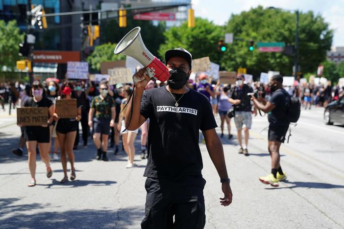 Atlanta erupts in protest after another black man dies at the hands of police