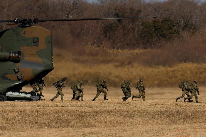 U.S. and Japan boost cooperation as Marines adapt controversial plan to counter China