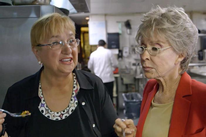 Rita Moreno shows Lidia one of her favorite childhood dishes from Puerto Rico. 