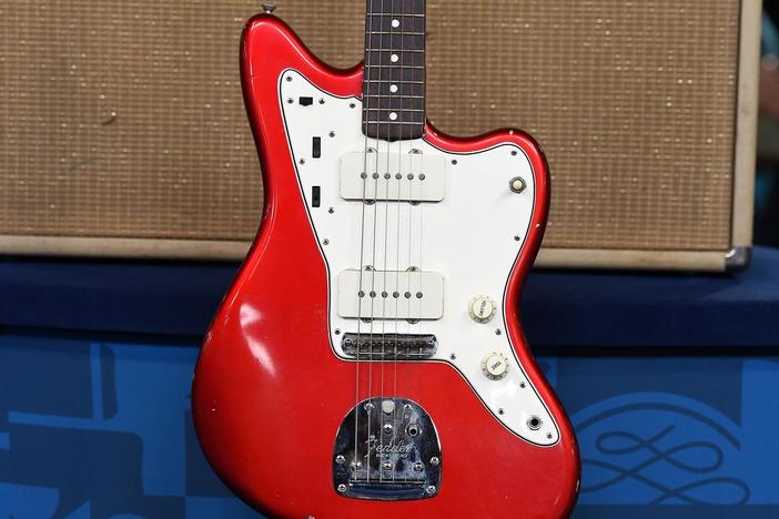 A story of theft lives in the strings of this rare candy apple red Fender Jazzmaster!