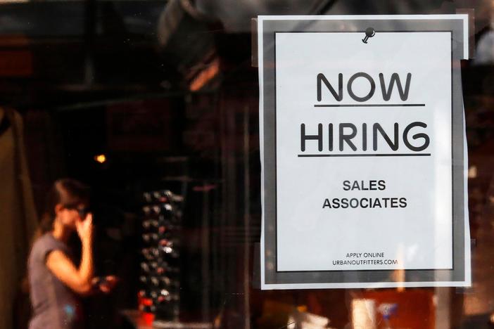 News Wrap: U.S. job growth slows but still shows solid gains in June