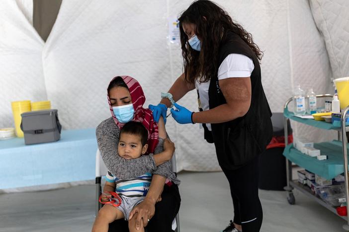 Mistrust, access issues keep Europe's asylum seekers, undocumented migrants unvaccinated