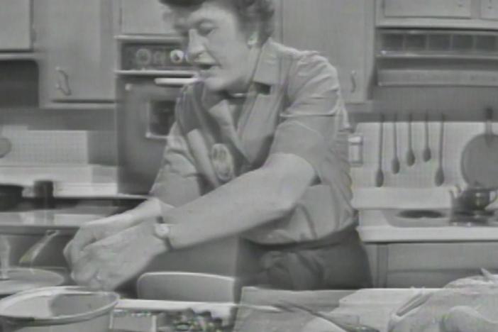 Julia Child demonstrates how she prepares a simple, yet elegant chicken breast with rice.