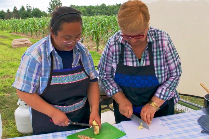 In Wasau, WI, Lidia makes Pork and Mustard Greens with Wisconsin's Hmong Community.