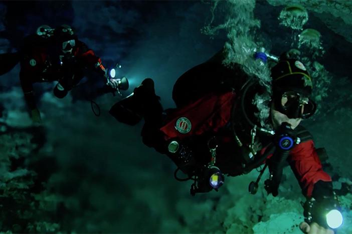 Cave divers take the risk to enter a secret underwater world to reveal its secrets.