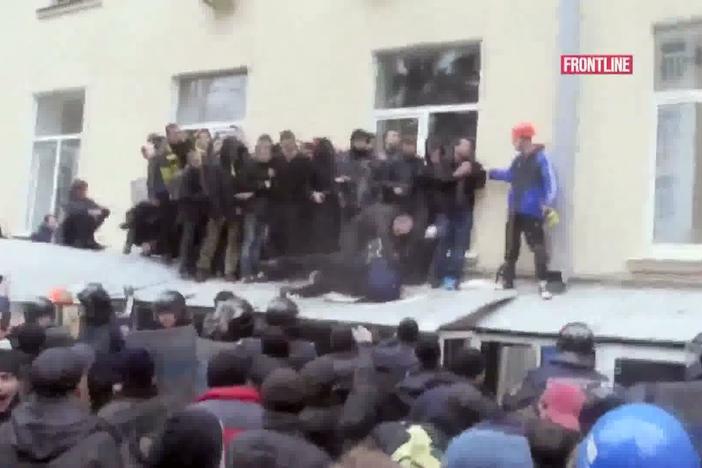 Pro-Russians storm a government building, brutally beating pro-Kiev demonstrators.