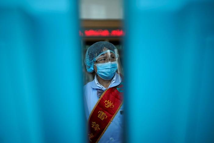 A year after virus appeared, Wuhan tells China's pandemic story