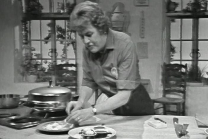 Julia Child demonstrates how to prepare a three course chop dinner in a hurry.