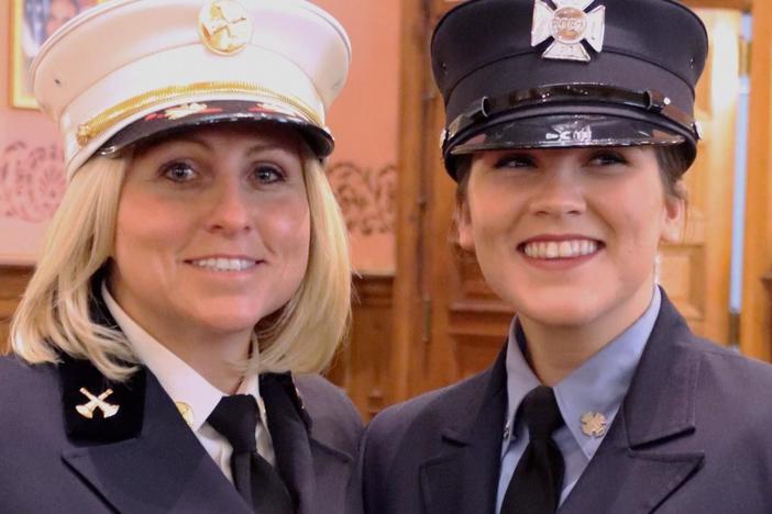 Lidia talks with two sisters who are firefighters for the Jersey City Fire Department.