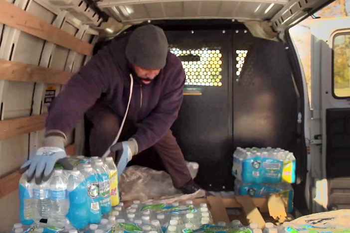 In Michigan, volunteers step up to deliver water amid crisis
