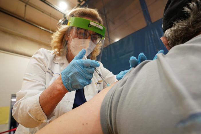 Despite being first in line, many health care workers are delaying vaccinations