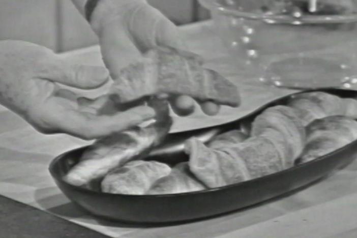 In this episode of The French Chef, Julia Child demonstrates how to make Croissants.
