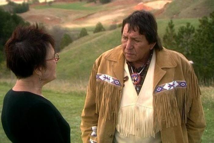 Gwen speaks to Alfred Red Cloud, chief of the Lakota.