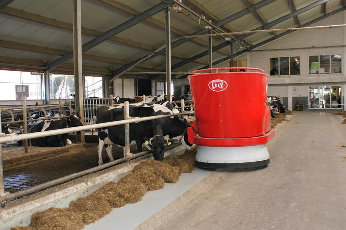 How robots can help give struggling dairy farmers a boost — if they can afford them