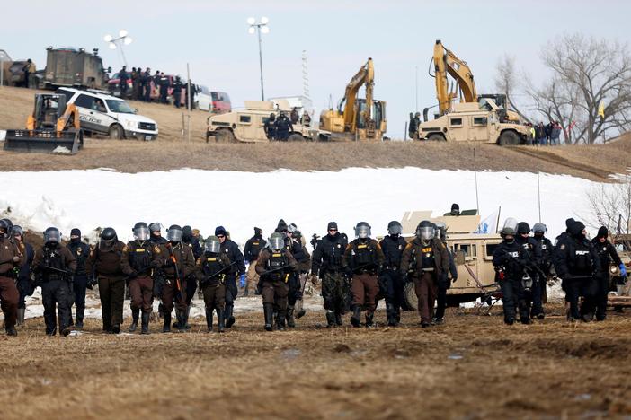 News Wrap: Judge halts Dakota Access Pipeline pending environmental review