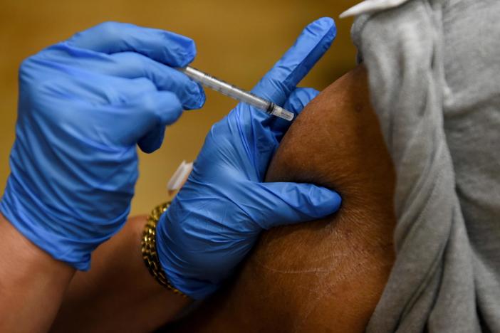 D.C.'s door-to-door COVID vaccine program hopes to increase trust among the hesitant