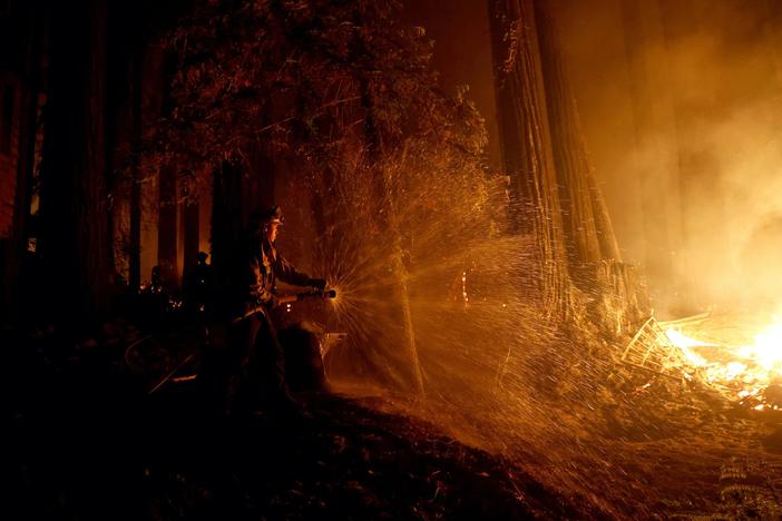 News Wrap: Firefighters still battling multiple blazes in California