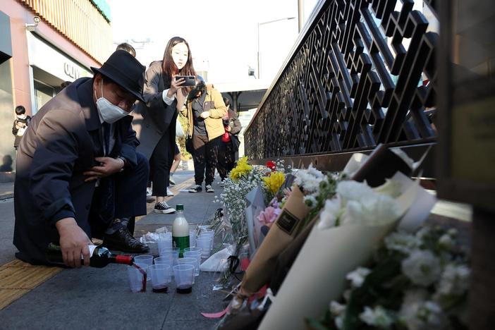 News Wrap: South Korea mourns victims of Seoul crowd crush