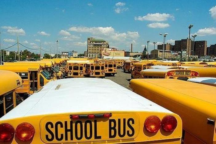 Students look at what's behind schools in their area labeled 'Dropout Factories."