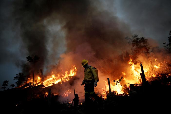 Climate change is driving wildfires, giving ‘rocket fuel’ to tropical storms