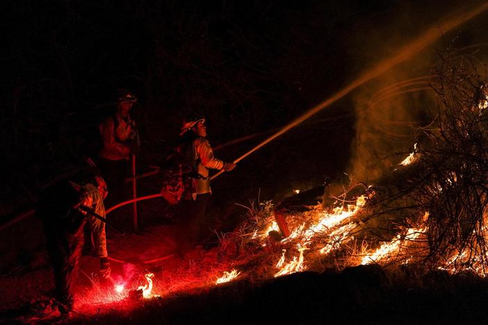 Global climate crisis hits home in the U.S. amid record heat and pervasive wildfires