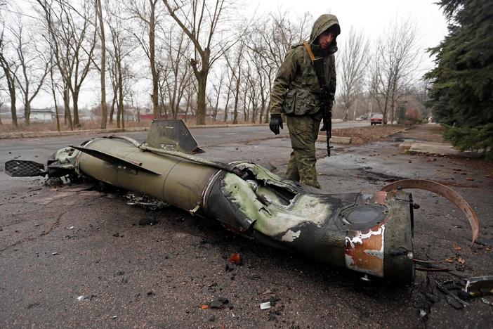 Ukraine resists advancing Russian forces as the West imposes tough new sanctions
