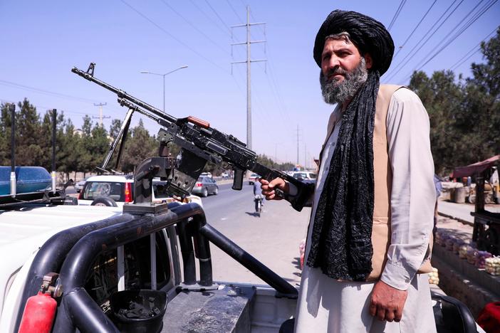 Two experts on Afghanistan's 'caretaker' government and its ties to other terrorist groups