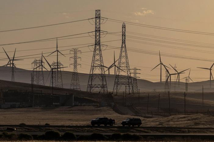Record-setting heat wave pushes California power grid to the brink
