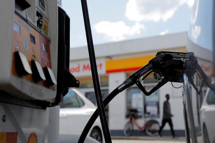 News Wrap: Cheaper gas helps ease U.S. inflation in November