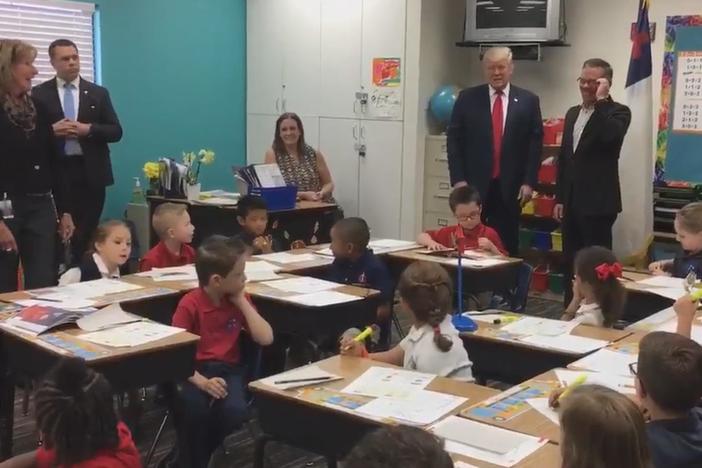 When Trump visits a classroom of 1st graders, their "authentic reactions" are recorded.