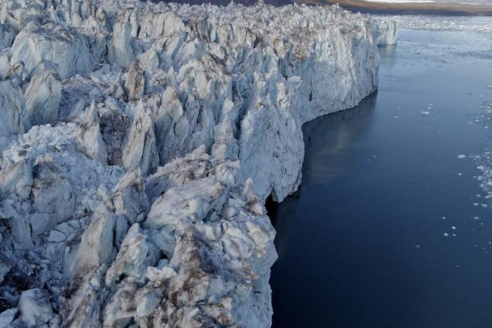 Glaciologist Heidi Sevestre studies timelapse footage of a surging glacier.