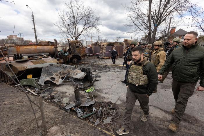 What international crimes are Russians committing in Ukraine?