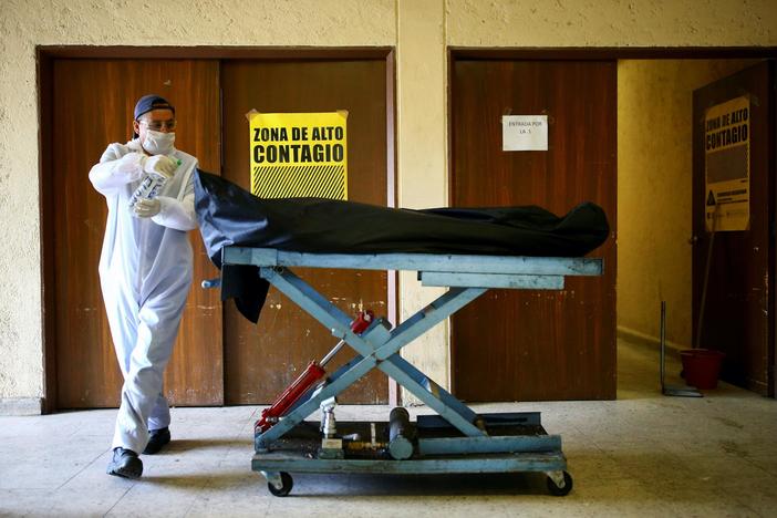 In government's absence, Mexicans turn to cartels for pandemic aid