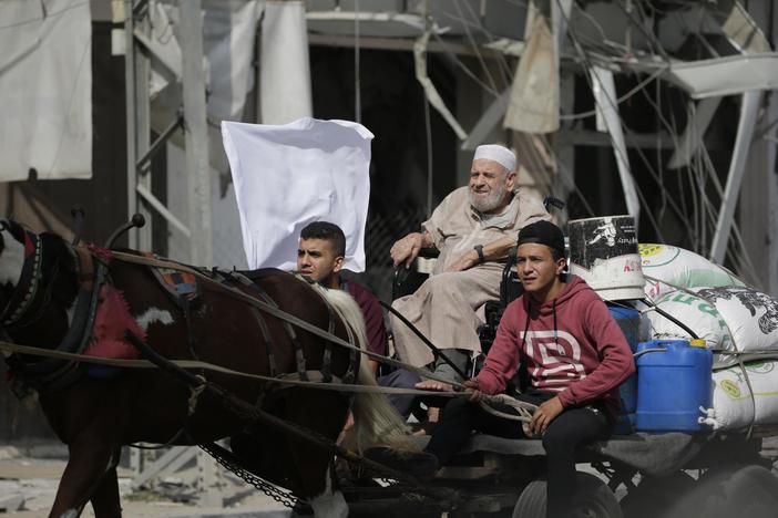 Gaza residents flee south as Israel’s military encircles Gaza City