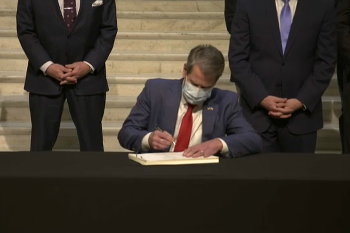 Governor Kemp and legislative leaders sign the amended fiscal year 2021 budget.