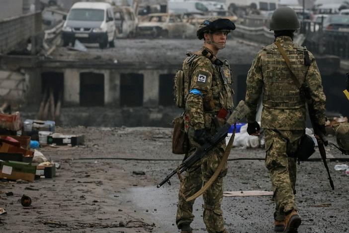 Russian forces retreat from Ukraine's capital region as civilians attempt to flee Mariupol