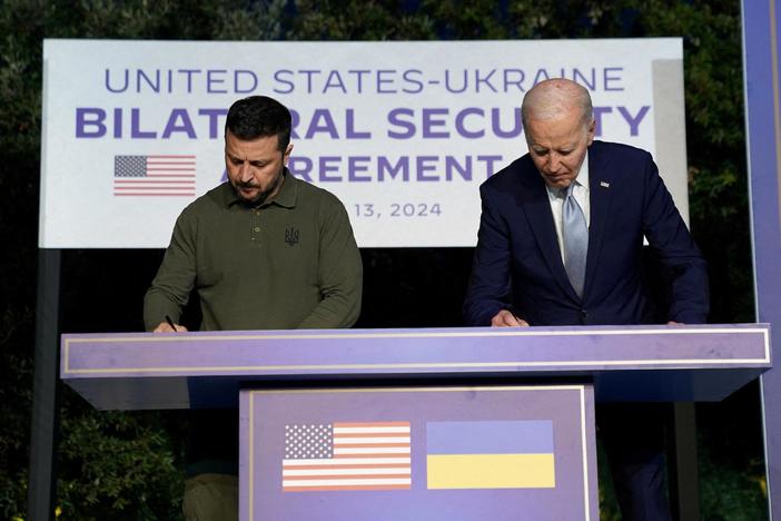 Biden, Zelenskyy sign security pact as G7 backs using frozen Russian assets to aid Ukraine