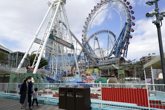 Japan's Tokyo Dome is shown before amusement rides began to reopen in the country. Japanese amusement park operators have asked people on rides at some parks not to scream.