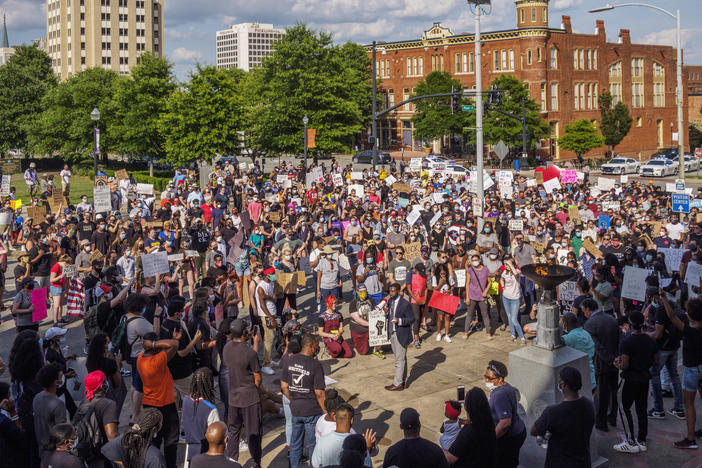 About 800 people marched in protest of police violence in Macon Tuesday. 