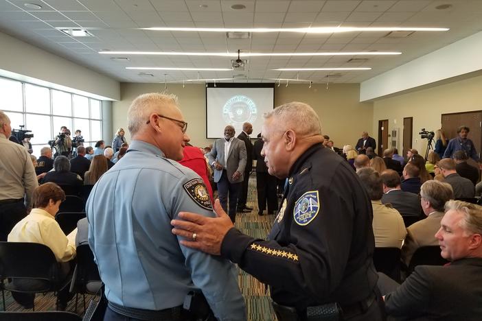 Chatham County Police Chief Jeffrey Hadley (left) greets Savannah-Chatham Police Chief Jack Lumpkin prior to Hadley's swearing in ceremony. The county and city departments will split Feb. 1.
